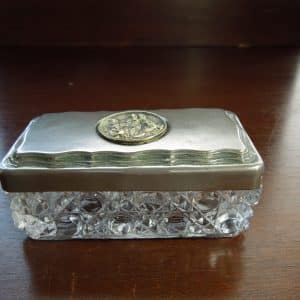 Trinket box with hobnail glass base and nickel silver lid.