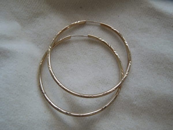 Large 9ct Gold round hoop earrings.