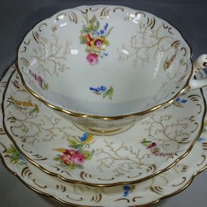 Antique Coalport Breakfast Cup trio.