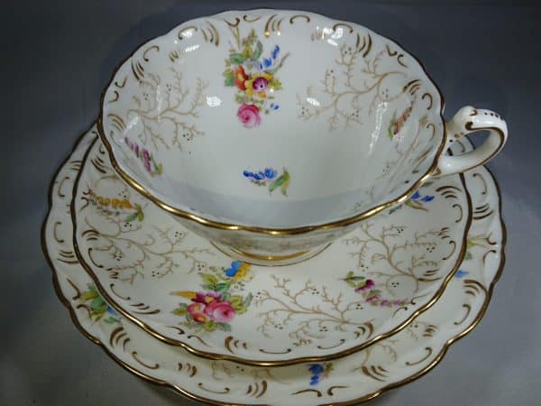 Antique Coalport Breakfast Cup trio.