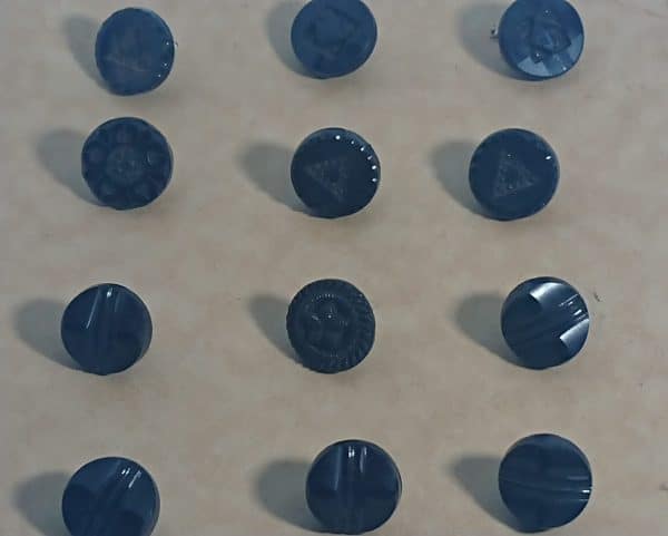 Victorian Black Glass Buttons in various designs.