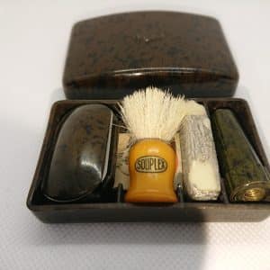 Vintage bakelite shaving kit with razor