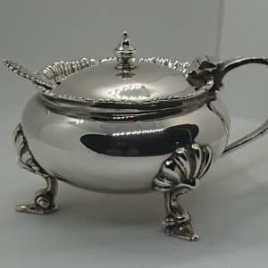 Solid silver mustard pot with spoon and blue glass liner