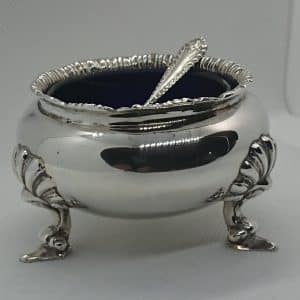 Silver salt and spoon with blue liner