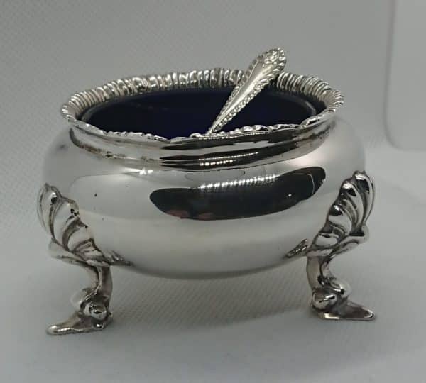 Silver salt and spoon with blue liner