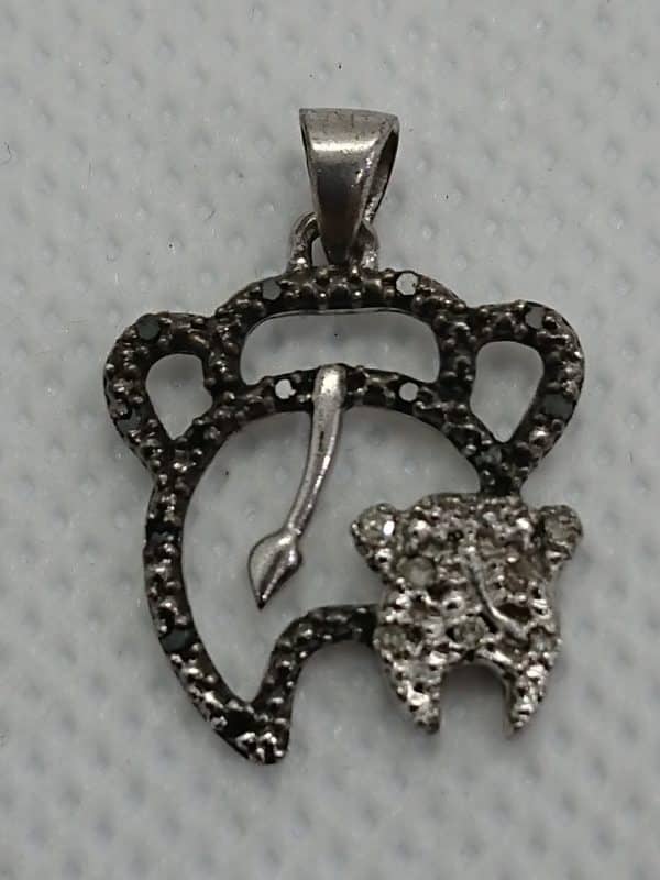 Black and White Diamond encrusted pendant