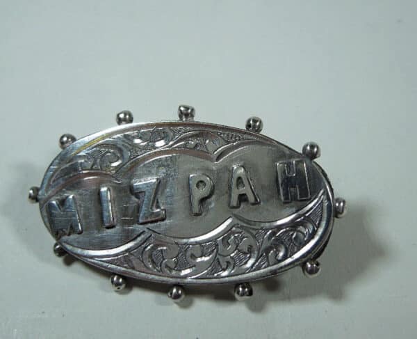 Silver Mizpah brooch