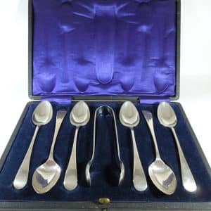 Silver Teaspoons and sugar tongs